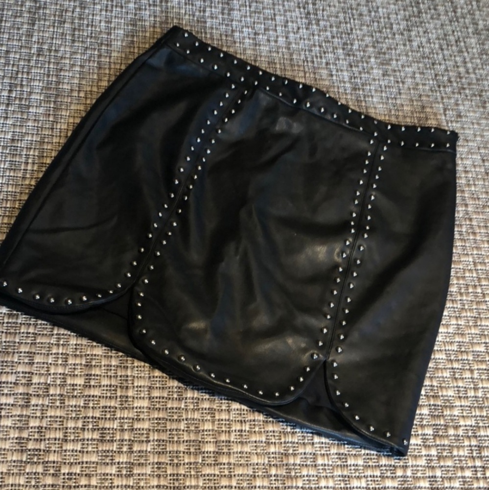 Pleather studded mini skirt. 🖤